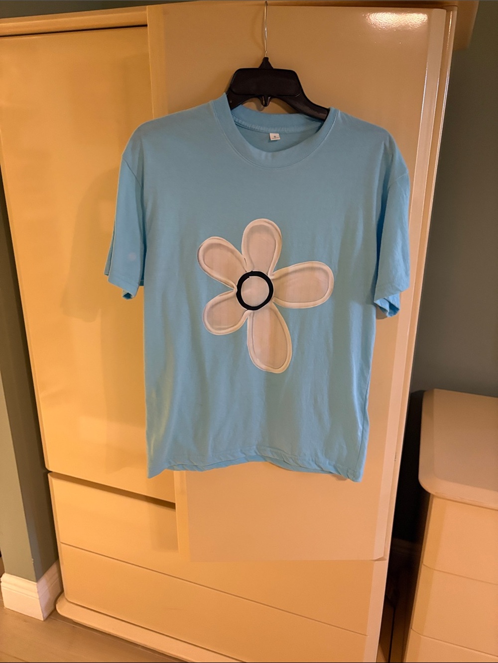 Woman’s Light Blue Flower Graphic Tee